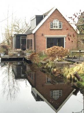 Гостиница Holiday home Koetshuis de Polderruimte  Berkenwoude
